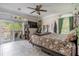 Bright bedroom with sliding glass doors to a balcony, offering plenty of natural light at 316 Lafayette Blvd, Oldsmar, FL 34677