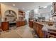 Spacious kitchen with stainless steel appliances and plenty of custom wood cabinetry with granite countertops at 316 Lafayette Blvd, Oldsmar, FL 34677