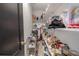 Walk-in pantry with ample shelving, providing plenty of storage space at 316 Lafayette Blvd, Oldsmar, FL 34677