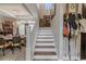 Bright staircase with dining room view and unique decor at 316 Lafayette Blvd, Oldsmar, FL 34677