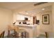 Bright kitchen features modern appliances and a breakfast bar with seating at 36750 Us 19 N # 24-211, Palm Harbor, FL 34684