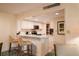 Bright kitchen features modern appliances and a breakfast bar with seating at 36750 Us 19 N # 24-211, Palm Harbor, FL 34684