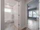 Bathroom with tiled bathtub and shower, as seen from doorway at 3906 N Lynn Ave, Tampa, FL 33603