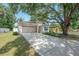 Charming home with a well-maintained lawn, shade tree, and a two-car garage at 3906 N Lynn Ave, Tampa, FL 33603