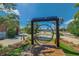 Fun playground swing frame near the Armature Works with city skyline backdrop at 3906 N Lynn Ave, Tampa, FL 33603