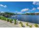 Picturesque waterfront view with floating dock and a bridge in the background at 3906 N Lynn Ave, Tampa, FL 33603