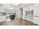 Modern kitchen with white cabinetry, stainless steel appliances, an island, and a skylight at 405 S Shore Crest Dr, Tampa, FL 33609