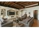 Elegant living room with custom built-ins, modern lighting, and cozy seating arrangement at 405 S Shore Crest Dr, Tampa, FL 33609