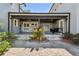 Covered patio with ceiling fans and outdoor cooking area, perfect for entertaining at 405 S Shore Crest Dr, Tampa, FL 33609