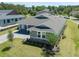 Beautiful single-Gathering home featuring a two car garage, landscaped yard, and stone veneer at 4056 Southern Valley Loop, Brooksville, FL 34601