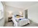 Cozy bedroom featuring soft carpeting, large windows, and a neutral color scheme for a tranquil atmosphere at 413 Meadow Ln # 81, Oldsmar, FL 34677