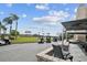 Scenic golf course with golf carts and lush greenery, perfect for outdoor recreation at 413 Meadow Ln # 81, Oldsmar, FL 34677