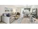 Cozy living room with comfortable seating, stylish decor, and lots of light at 413 Meadow Ln # 81, Oldsmar, FL 34677