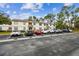 Well-maintained parking lot serving the residential building at 413 Meadow Ln # 81, Oldsmar, FL 34677
