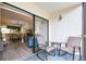 Relaxing patio with seating overlooking the interior living space and a comfortable exterior at 413 Meadow Ln # 81, Oldsmar, FL 34677