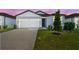 Charming single-Gathering home with a two-car garage and well-maintained landscaping at 4303 Big Sky Dr, Spring Hill, FL 34604