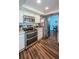 Modern kitchen featuring stainless steel appliances and sleek countertops at 455 Cypress Lake Ct, Oldsmar, FL 34677