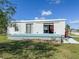 The exterior view shows a deck, offering a private outdoor living space at 4609 10Th Street E Ct, Ellenton, FL 34222
