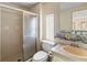 Bathroom features a shower, toilet, and vintage-style sink at 4609 10Th Street E Ct, Ellenton, FL 34222