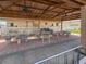 Outdoor clubhouse seating area with shaded tables and seating provides a perfect spot for relaxation and socializing at 4609 10Th Street E Ct, Ellenton, FL 34222
