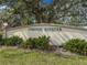 Landscaped entrance to Tidevue Estates shows well-maintained grounds and a welcoming community atmosphere at 4609 10Th Street E Ct, Ellenton, FL 34222