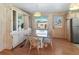 An airy dining room boasts a glass table, and ample cabinet space at 4609 10Th Street E Ct, Ellenton, FL 34222