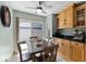 Bright kitchen features sliding door and a cozy dining table at 5032 Cypress Trace Dr, Tampa, FL 33624