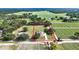 Aerial view of property bordered in red, surrounded by farmland and mature trees at 5319 W Trapnell Rd, Dover, FL 33527