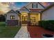 Inviting front entrance with stone accents and a brick walkway at 5319 W Trapnell Rd, Dover, FL 33527