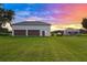 Detached garage with two bays and shed on a spacious lot at 5319 W Trapnell Rd, Dover, FL 33527