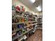 Spacious walk-in pantry with multiple shelves and ample storage for food and household items at 5319 W Trapnell Rd, Dover, FL 33527