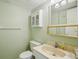 Bathroom with neutral-colored walls, white vanity, and medicine cabinet at 6020 S Shore Blvd # 709, Gulfport, FL 33707