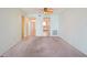 Living room with ceiling fan and views to the kitchen and hallways at 6020 S Shore Blvd # 709, Gulfport, FL 33707