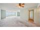 Large living room featuring water views, and ceiling fans at 6020 S Shore Blvd # 709, Gulfport, FL 33707