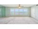 Light-filled living room featuring water views at 6020 S Shore Blvd # 709, Gulfport, FL 33707
