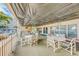 Inviting patio with shaded seating, ideal for enjoying outdoor meals and socializing with views of the community at 6020 S Shore Blvd # 709, Gulfport, FL 33707