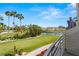 Scenic view of the lush golf course and tranquil lake, viewed from a balcony overlooking the green space at 6131 Bahia Del Mar Blvd # 241, St Petersburg, FL 33715