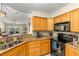 Well-equipped kitchen with stainless steel appliances and a view at 6131 Bahia Del Mar Blvd # 241, St Petersburg, FL 33715
