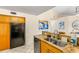 Functional kitchen with stainless steel appliances, granite countertops, and ample storage at 6131 Bahia Del Mar Blvd # 241, St Petersburg, FL 33715