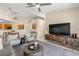 Bright living room with tile floors, ceiling fan, and stylish decor at 6131 Bahia Del Mar Blvd # 241, St Petersburg, FL 33715