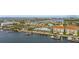 Scenic aerial view featuring waterfront condos, marina, and restaurant at 6319 Sunset Bay Cir, Apollo Beach, FL 33572