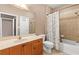 Neutral toned bathroom with a single sink and bathtub-shower combo at 6319 Sunset Bay Cir, Apollo Beach, FL 33572