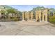 Outdoor common area with seating and a fire pit feature, perfect for entertaining or relaxing with neighbors at 6319 Sunset Bay Cir, Apollo Beach, FL 33572