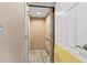 View of the functional elevator with wood paneling and modern flooring at 6319 Sunset Bay Cir, Apollo Beach, FL 33572