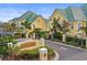 Inviting entrance to Sunset Bay with lush landscaping and attractive signage at 6319 Sunset Bay Cir, Apollo Beach, FL 33572