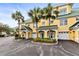 Neat condo complex featuring well-kept exteriors, landscaping, and attached garages at 6319 Sunset Bay Cir, Apollo Beach, FL 33572
