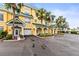 Attractive condo exterior with attached garages and well-maintained landscaping at 6319 Sunset Bay Cir, Apollo Beach, FL 33572
