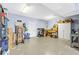Organized garage featuring ample storage, work area, and easy access to the house at 6319 Sunset Bay Cir, Apollo Beach, FL 33572