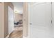 Hallway with elevator and dining area view showing an open concept at 6319 Sunset Bay Cir, Apollo Beach, FL 33572