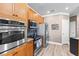 Modern kitchen with stainless steel appliances and plenty of cabinet space at 6319 Sunset Bay Cir, Apollo Beach, FL 33572